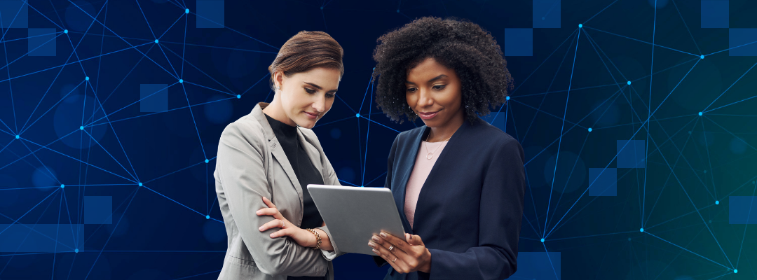 Two legal professionals reviewing AI output on a device.