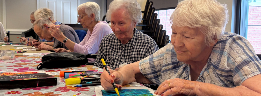 Lifelong University participants work on creative projects