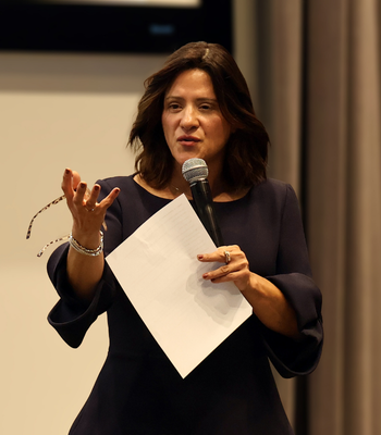 Claudia Aguirre, Ed.D., president and CEO of BakerRipley, delivering keynote address.